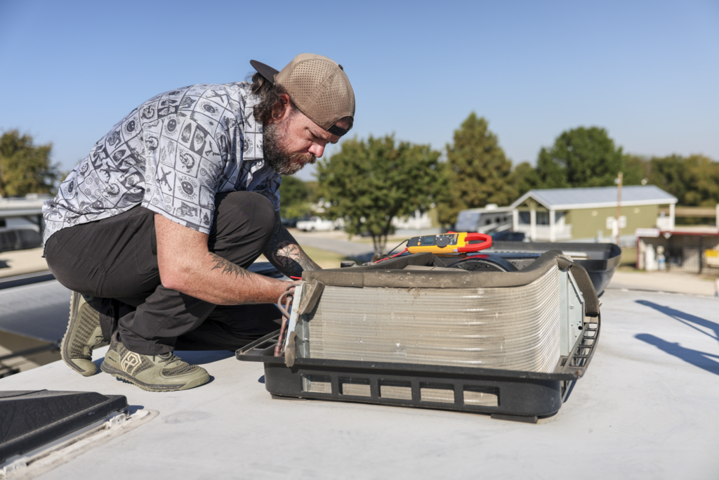 RV Technician on roof
